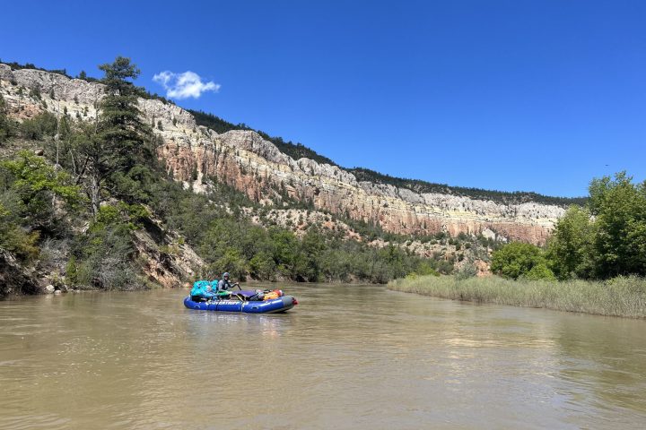 a small boat in a body of water